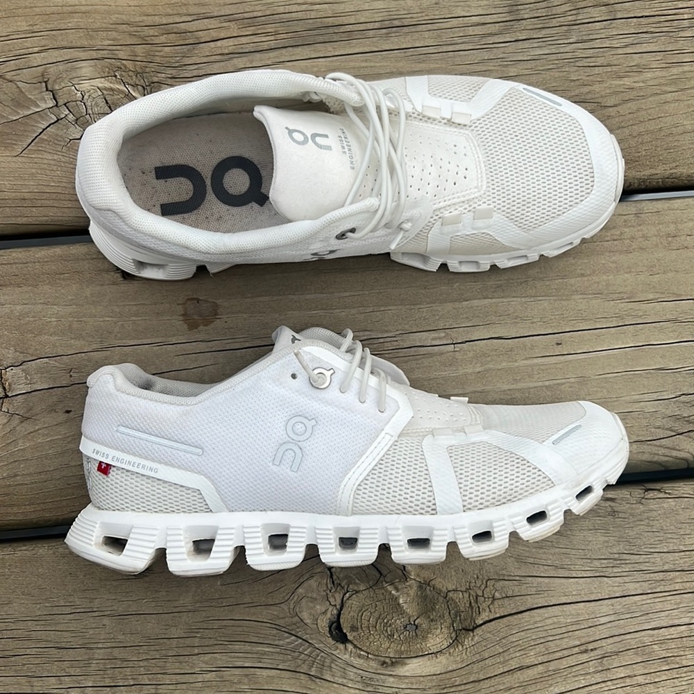 On cloud running shoes. white